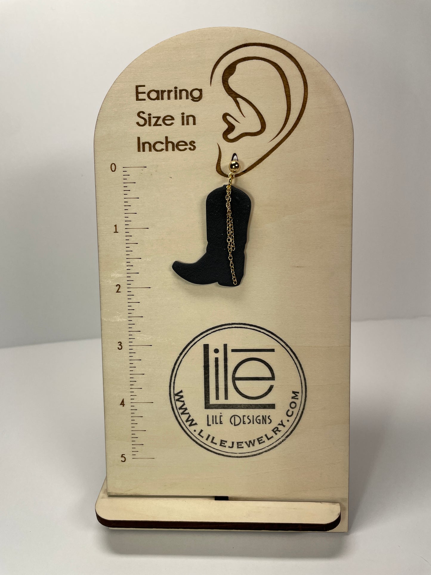 Black boot dangles
