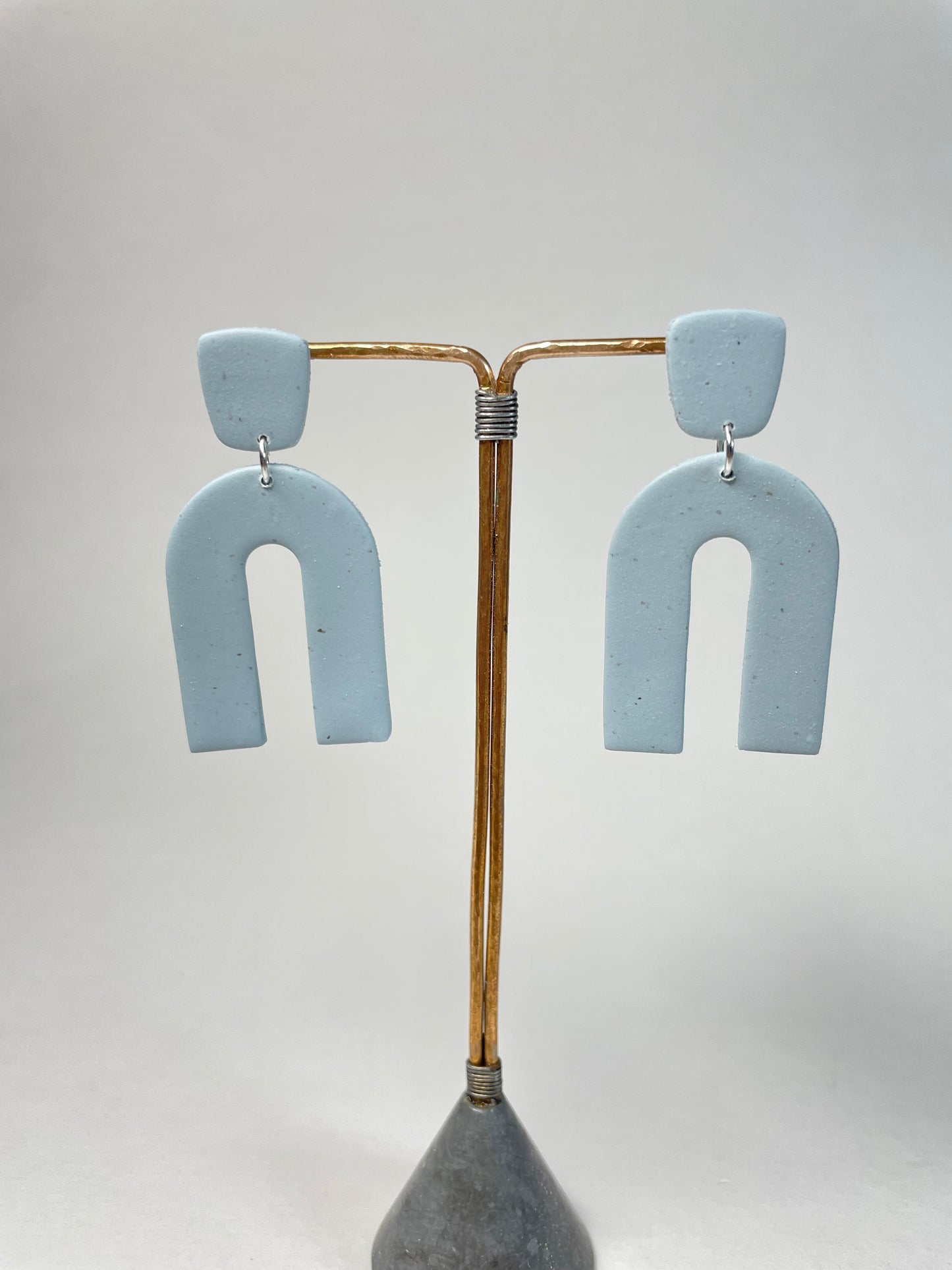 Speckled horseshoe dangles