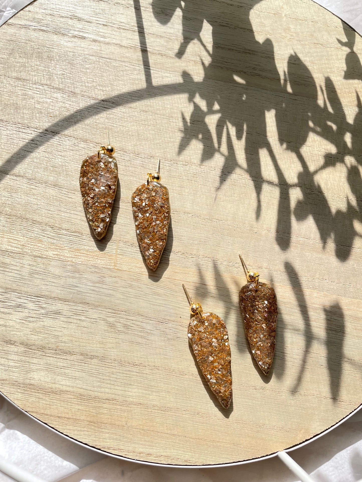 Gold dagger dangles