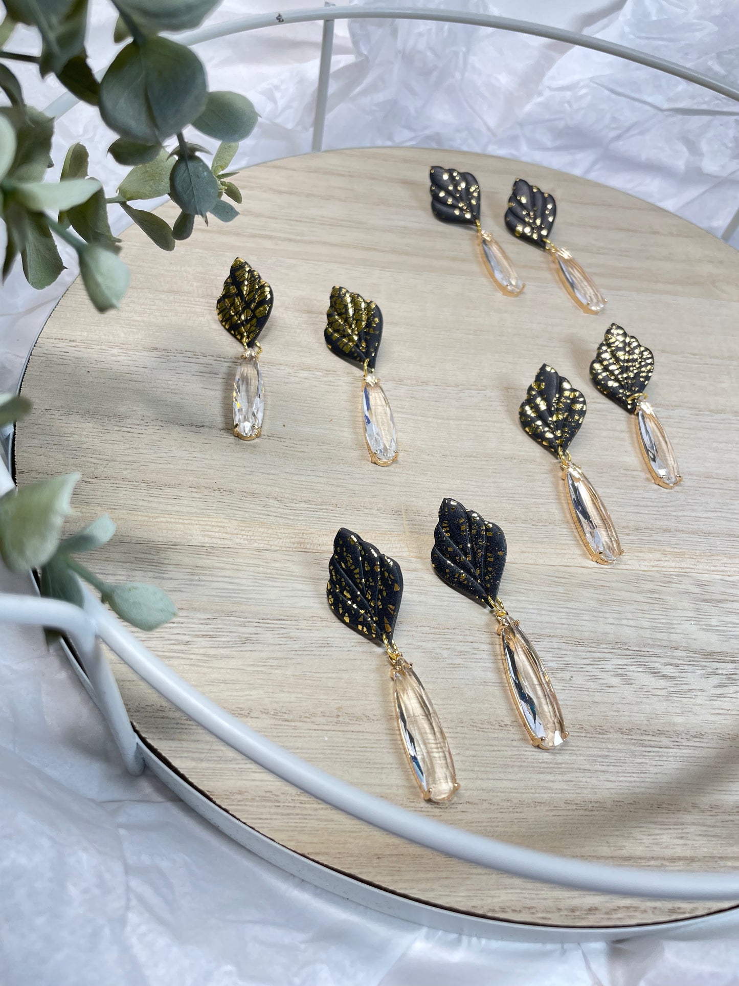 Black and gold crystal drop