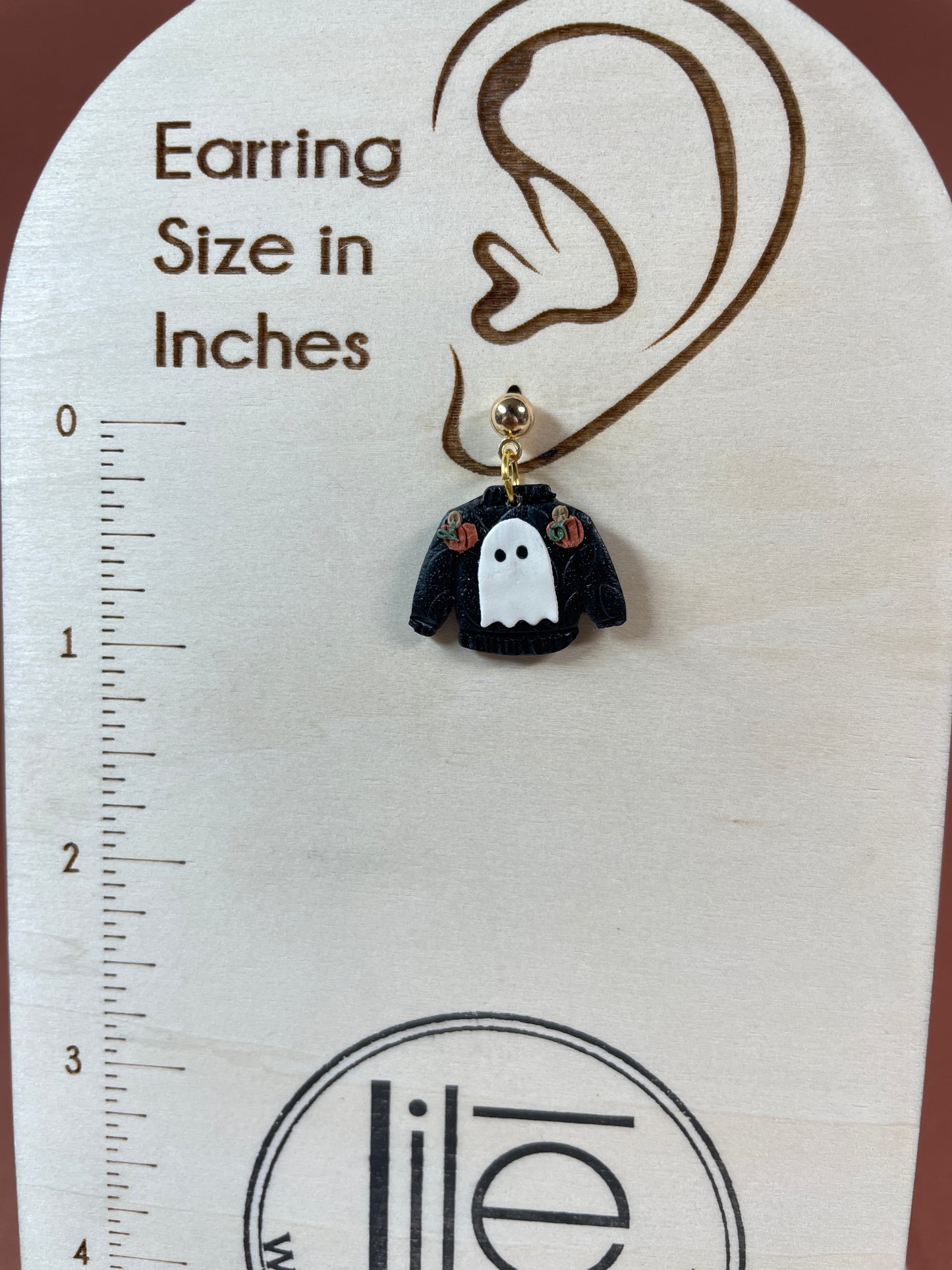 Black ghost sweater dangles