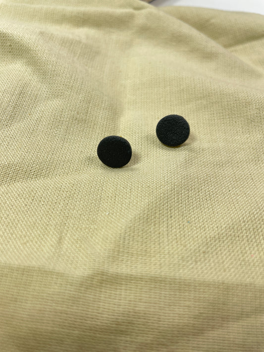 Black circle studs